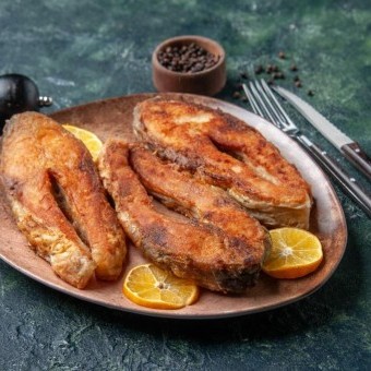سمك السيباس بالأوريغانو والحامض