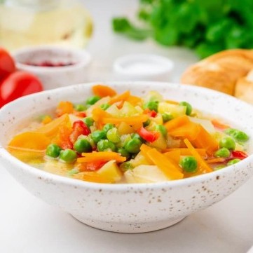 يخنة بطاطا وبازيلا وجزر مع الأرز