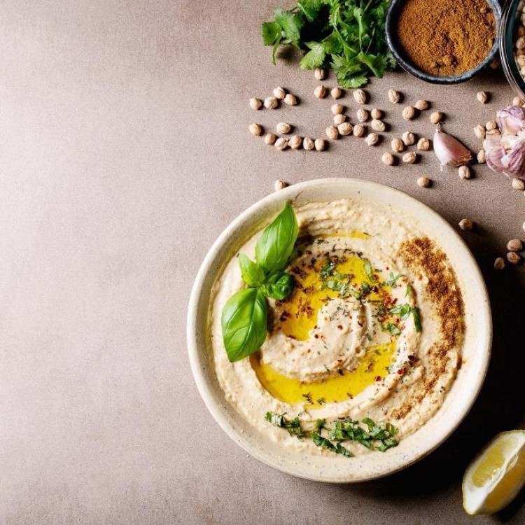 حمص بالطحينة على أصوله