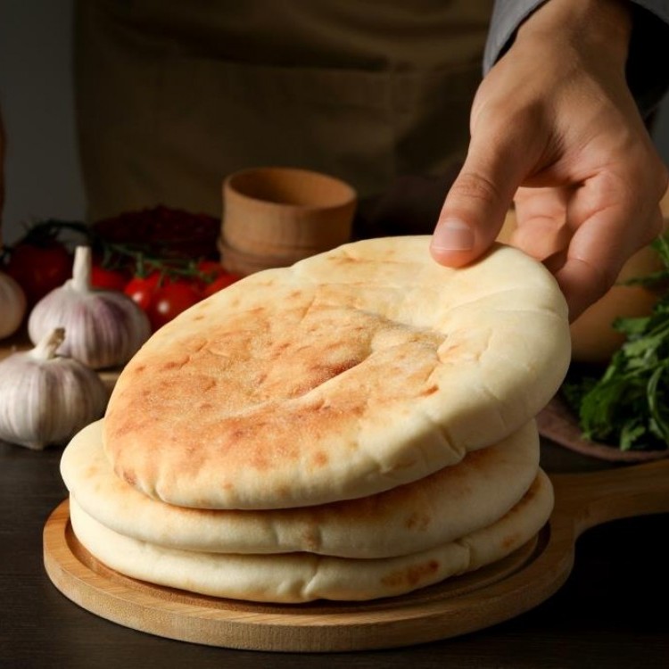 تجربتي مع صنع الخبز العربي في المنزل