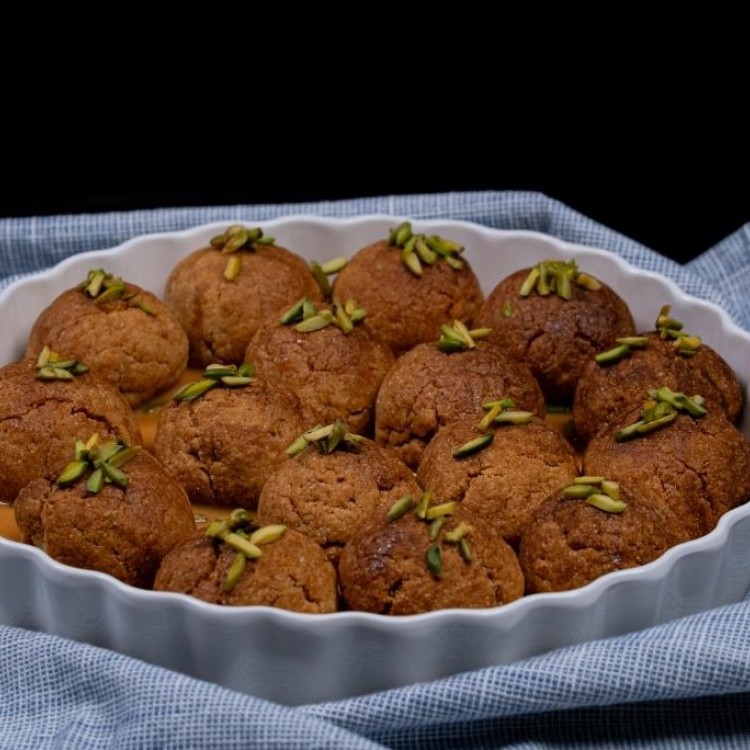 صينية كرات البسبوسة بالفيديو