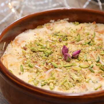 أم علي بالمكسرات والقشطة